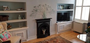 Antique fireplace is decorative only. 