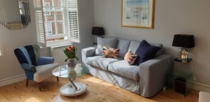 Plantation shutters in living room, bathroom and kitchen