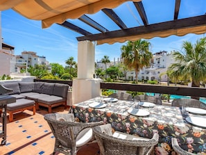 Sky, Property, Furniture, Plant, Building, Chair, Shade, Interior Design, Outdoor Furniture, Tree