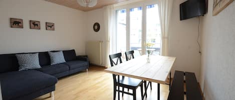 Open plan lounge dining room. Smart TV with Netflix. Leads onto balcony.