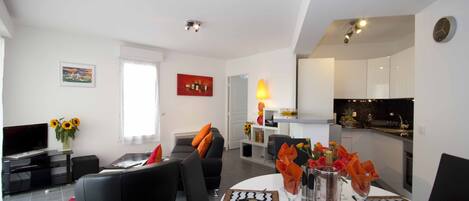 Living area and open plan kitchen