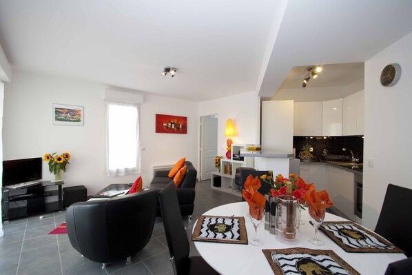 Living area and open plan kitchen