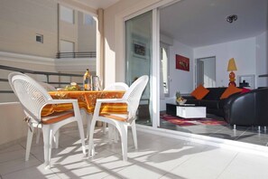 Sunny balcony facing internal courtyard