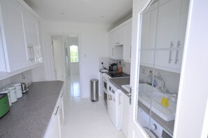 A galley kitchen with everything you need for a comfortable stay...