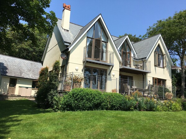 south elevation, terrace, part of garden, & garage from the south