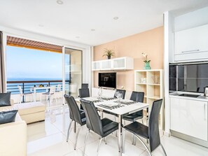 Furniture, Interior Design, Flooring, Floor, Table, Chair, Apartment, Room, Ceiling, Sea