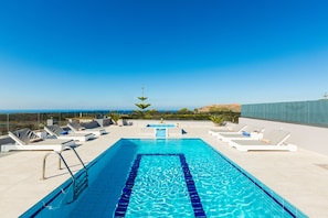 The pool terrace offers amazing sea views.