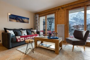 Bright living room with a Mont Blanc view