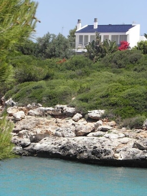 View of the villa from the other side of the bay