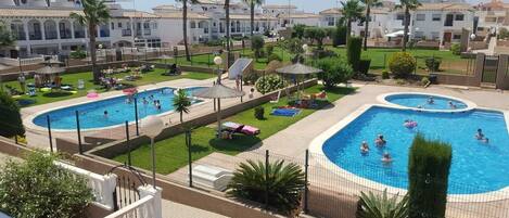 South Facing Balcony views 
2 Main + 2  Child Pools 
Palm Tree Communal Garden 