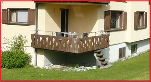 The apartment: left, the kitchen window; right, the living- and bedroom window. 