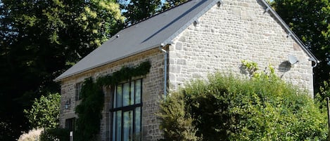 Normandy Barn lazing in the sunshine