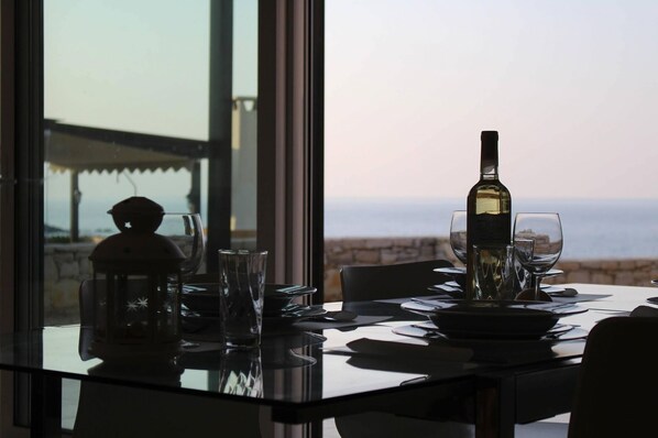 Relaxing with sea views from Villa Athena dining area 