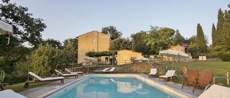 View of the farmhouse La Tinaia from the pool