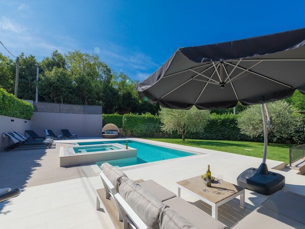 Property, Sky, Plant, Swimming Pool, Building, Azure, Shade, Outdoor Furniture, Architecture, Cloud