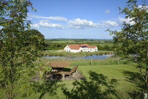 Picnic bench with far reaching views over the Wolds and cottages