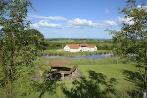 Picnic bench with far reaching views over the Wolds and cottages