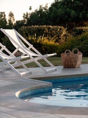 Unwind and relax at the lovely poolside.