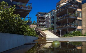 Waterfall next to apartment