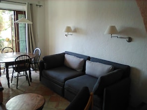Living room with doors to terrace