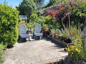 Take in the sun on the sunbeds in the private back garden. 