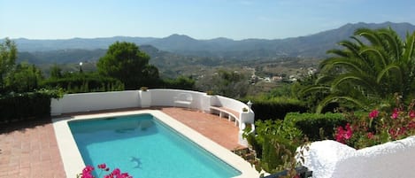The private pool with views across the Mijas hills