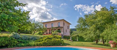 Villa L'Arco: Air Con Living Room:glass doors leading 