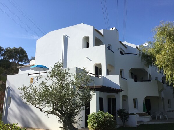 Second floor end apartment with large wrap around sun terrace.