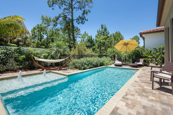 Pool with view into natural preserve