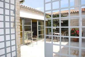 Entrance via a private patio, away from prying eyes