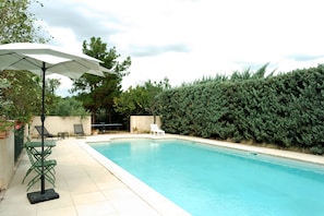 Sun loungers at poolside