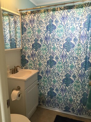 Bathroom for the bedrooms has a tub/shower 