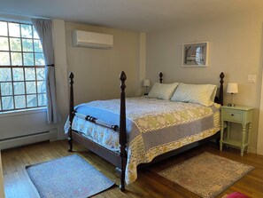 Downstairs bedroom with queen bed