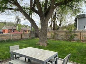 Fenced in yard...picnic table