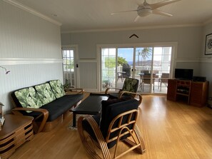 Living room looking toward lanai with view of Diamond Head and ocean