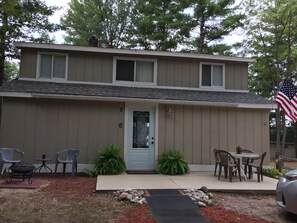 Our cabin front with fire pit