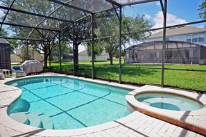 Pool area with hot tub