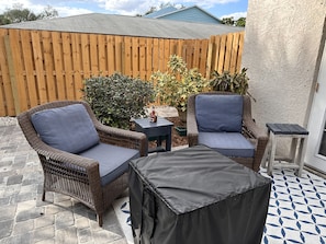 Patio chairs with outdoor firepit for a nice relaxing evening.
