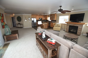 The open floor plan and nice furnishings make this a great space to relax.