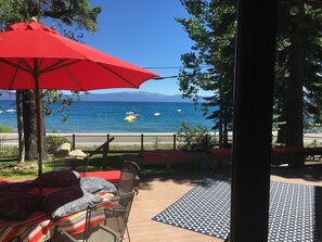 large deck with beautiful views of the lake, looking our from the living room