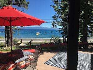 large deck with beautiful views of the lake, looking our from the living room