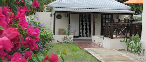 Beautiful cottage within a gated flower garden. All the amenities of home!