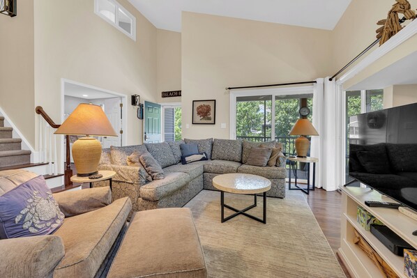 Light filled great room with high ceilings. 