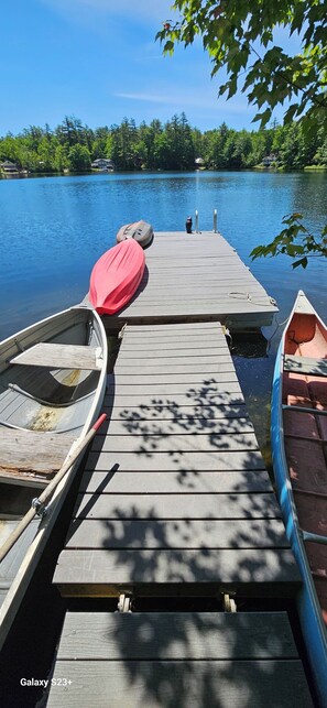 24' dock Kayaks, rowboat and canoe. Dock can be easily detached for all-day sun.