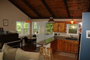Kitchen and Dining area, with view of lake, next to Living Room