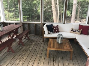 Screened-in porch for bug-free meals or lounging