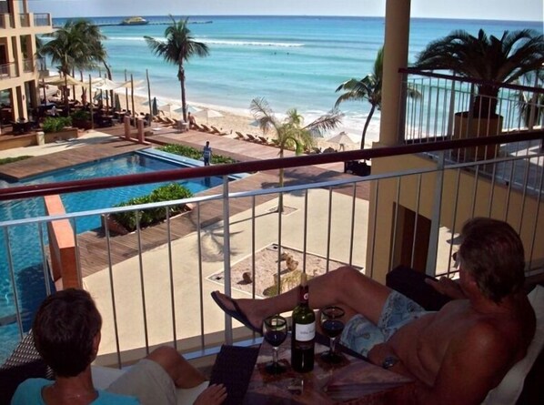 Enjoy Life from our balcony beautiful ocean and pool view and sunrises, too