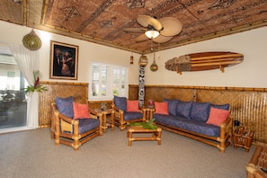 tropical living room installed by Gecko with bamboo, tapa,  hand carved trim.