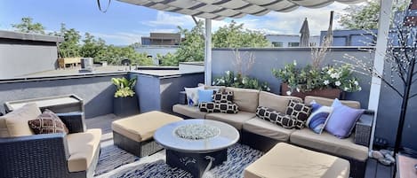Relax and take in the view from the private rooftop deck!