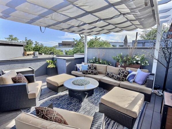 Relax and take in the view from the private rooftop deck!